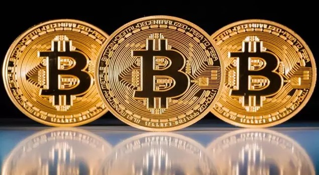 بيتكوين تكسر حاجز الـ 70 ألف دولار لأول مرة في تاريخها 1 بيتكوين تكسر حاجز الـ 70 ألف دولار لأول مرة في تاريخها