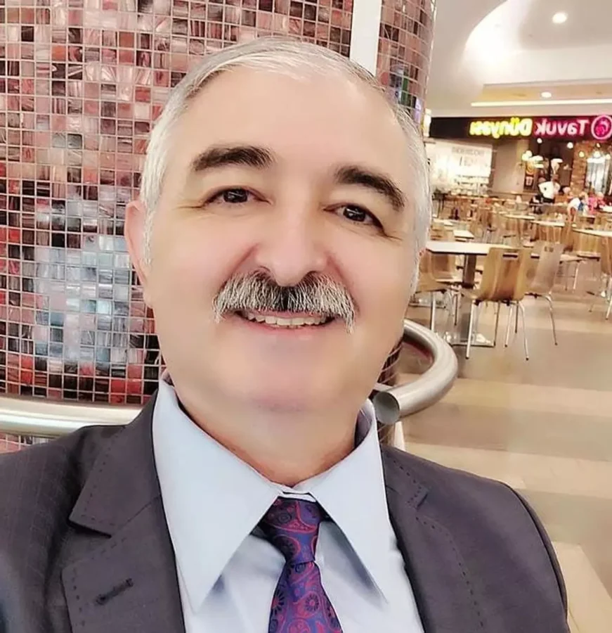 Kayıp profesörün cesedi, ellerinden iple bağlanmış halde çayda bulundu